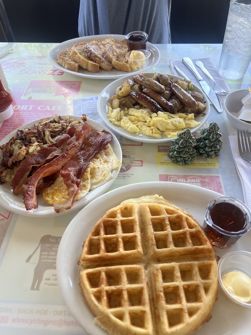 Breakfast plates on a casual diner table.